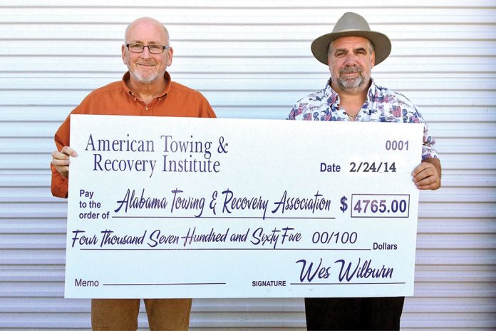 American Towing & Recovery Institute Presented with a Check