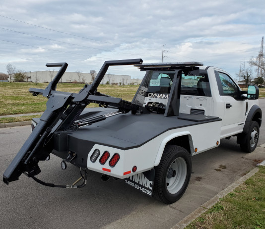 Dynamic announces they are now building wrecker bodies for chassis that have a rear fuel tank